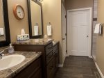 Master Bathroom with his/her sinks